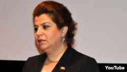  Gular Ahmadova was arrested in February 2013 after a video circulated on the Internet in September 2012 showing her demanding a $1.3 million bribe from an academician to secure a seat in parliament for him.