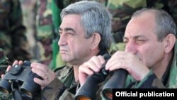 Nagorno-Karabakh - Armenian President Serzh Sarkisian (L) watches military exercises in Nagorno-Karabakh.