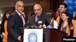 Armenia - Zharangutyun party leader Raffi Hovannisian (L) and Free Democrats party leader Khachatur Kokobelian announce the start of their bloc's election campaign, 9Apr2012.