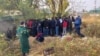 The November 7 funeral ceremony for Izatullo Latifiov, a Tajik border guard killed in the attack. 